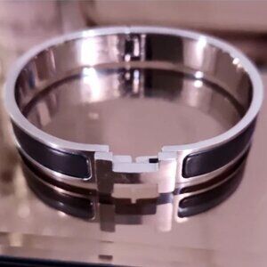 Hermès Clic H silver and black bracelet